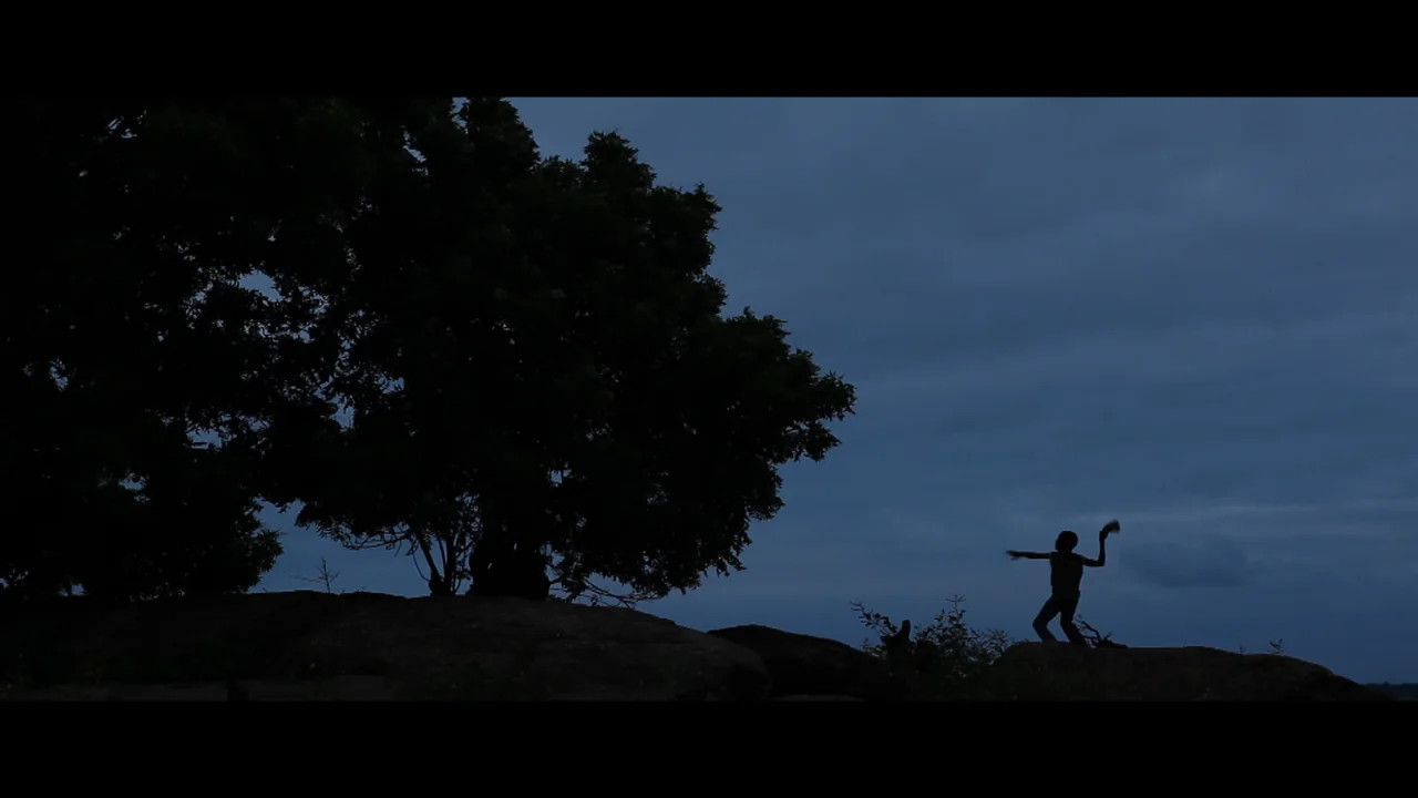 A child fisherman on Lake Volta at first light